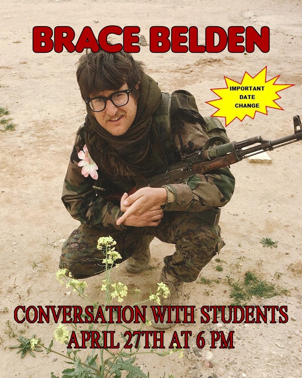 Brace Belden in camo gear squats on sandy ground, pointing at flowers with a rifle in his arms. Text: 